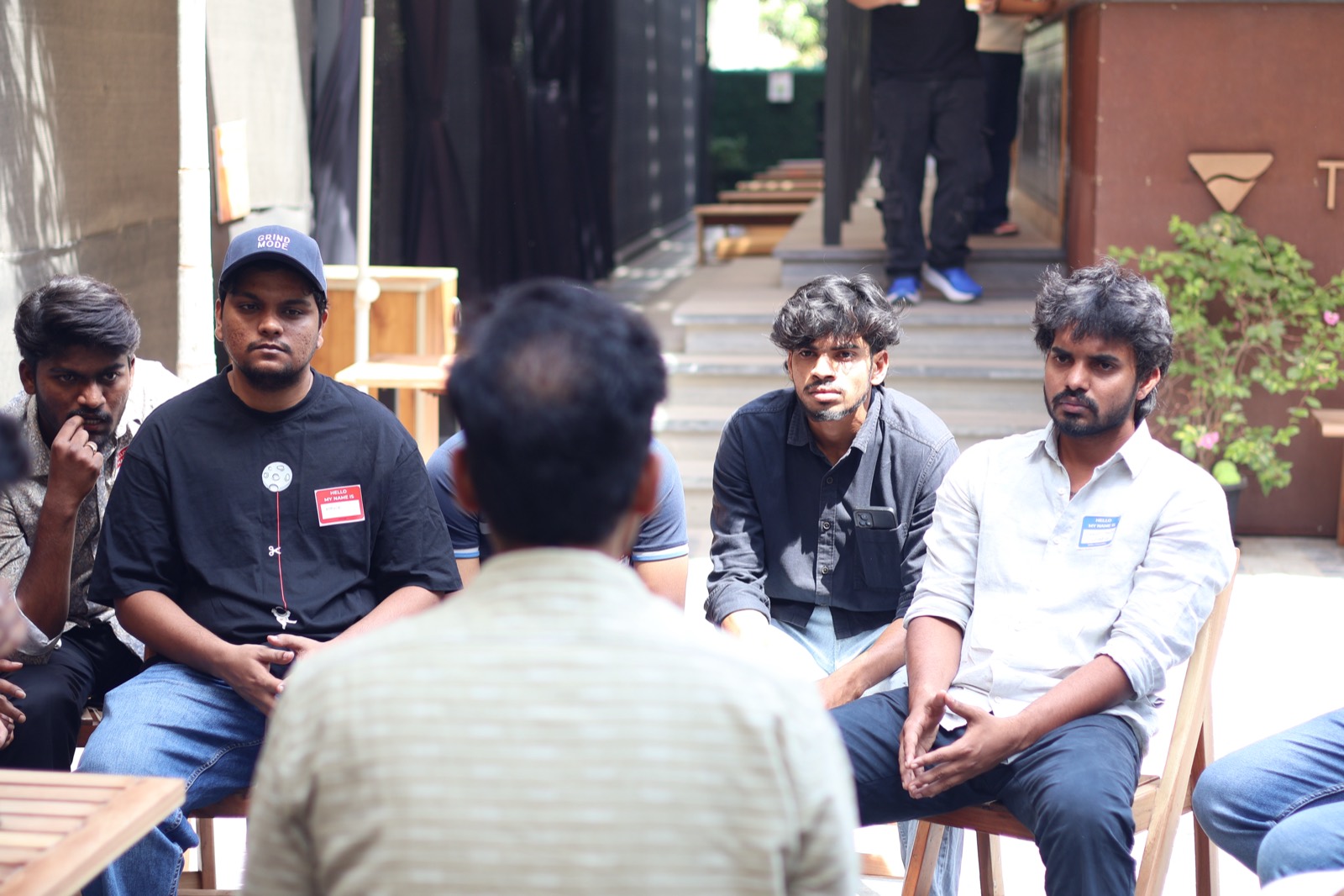 Founders listening during a VentureXlabs meetup